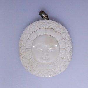 Sunshine carved pendant from bone NWOT